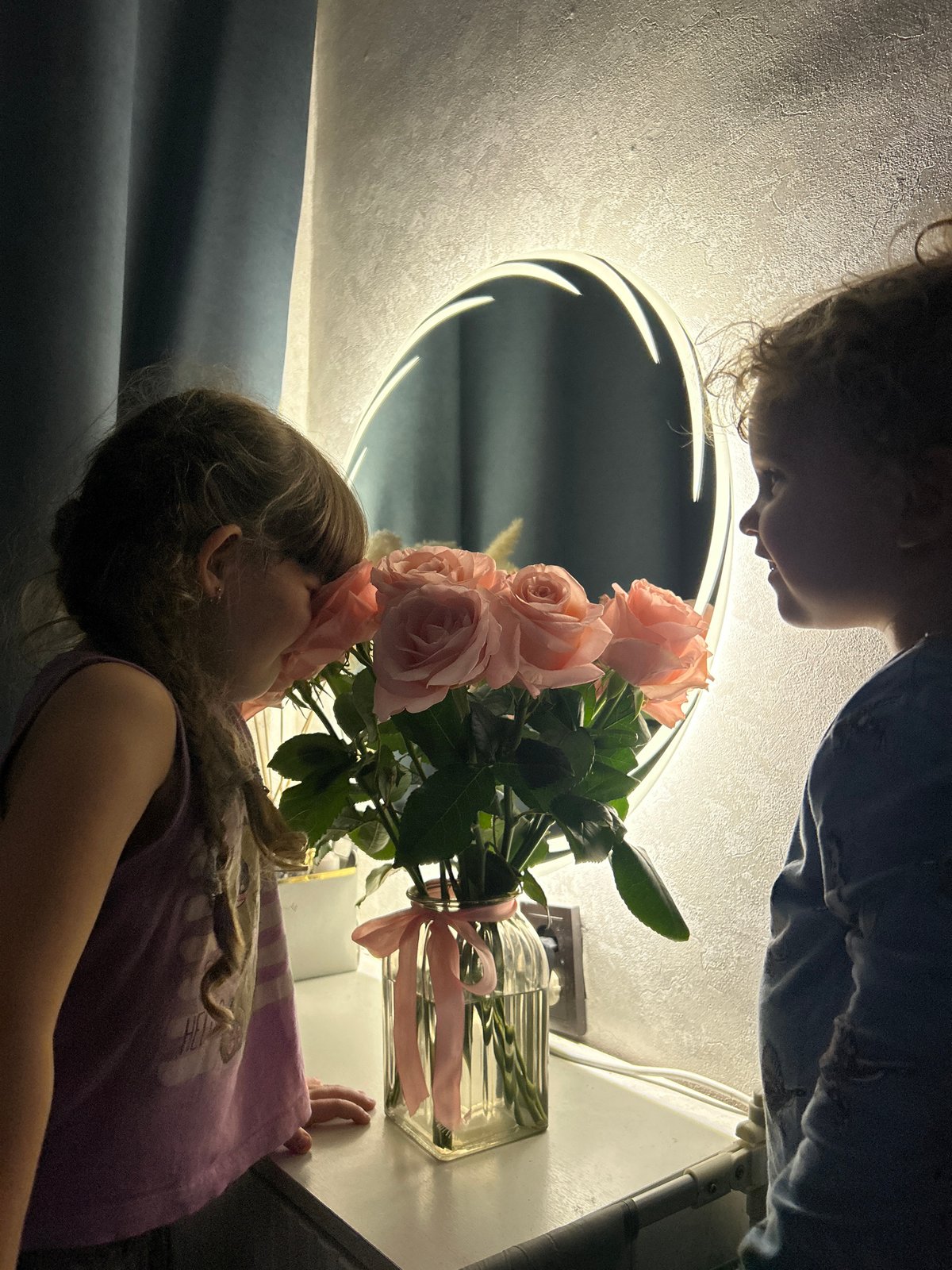 Woman takes mirror selfies in bedroom in Klin, Russia