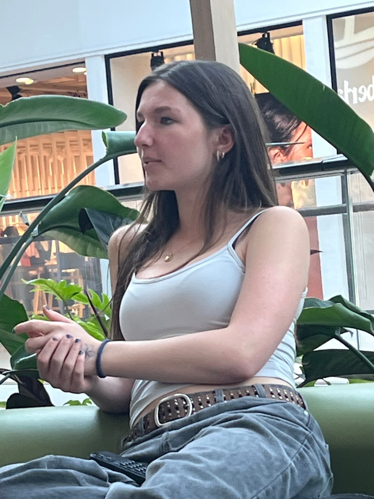 Woman spotted indoors in Luxembourg wearing casual attire