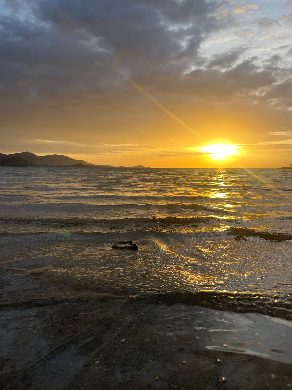 Sunset observed over ocean at Baan Plai Laem, Thailand