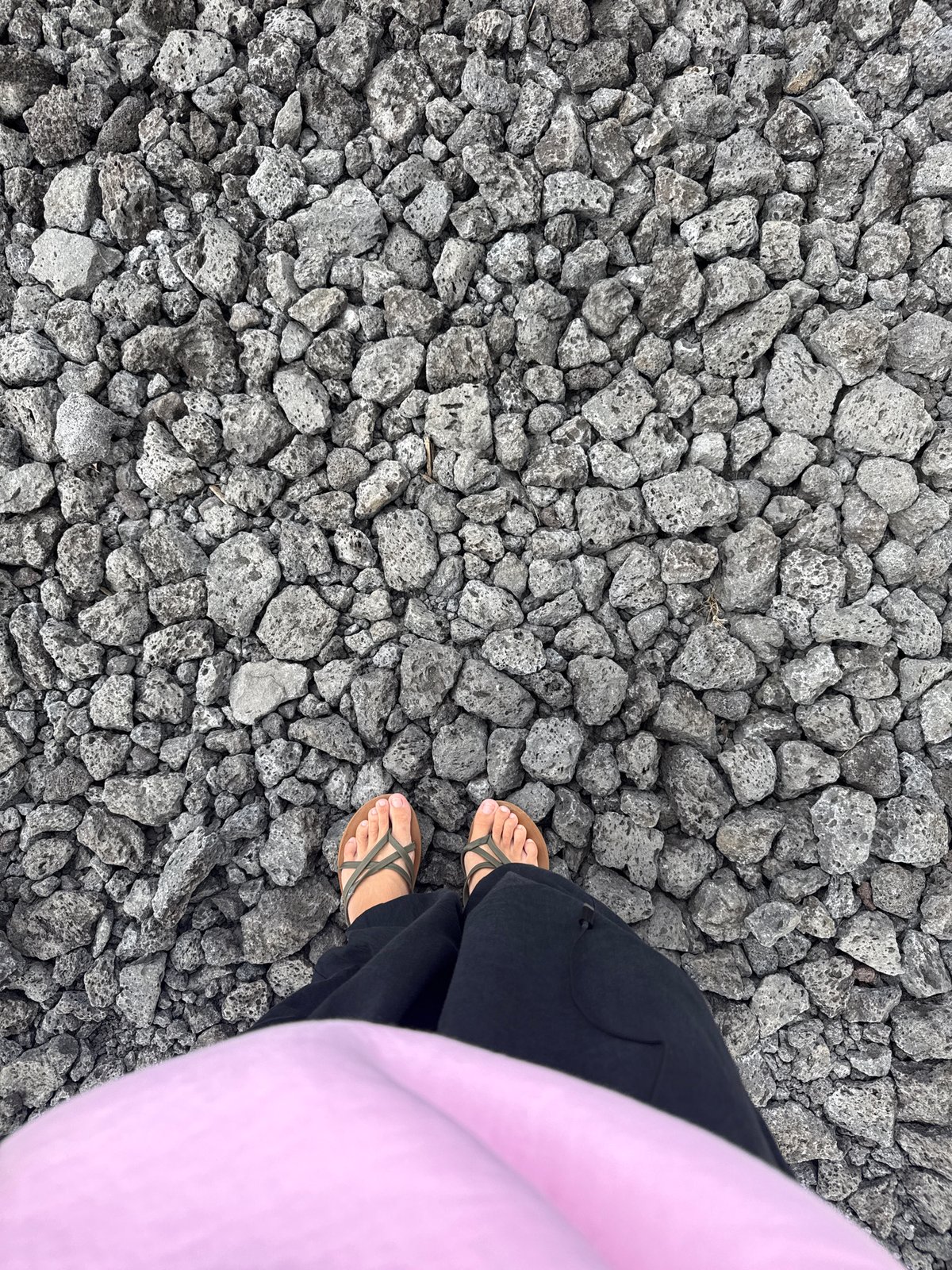 Exploring Kintamani's black lava fields on a cloudy Bali morning
