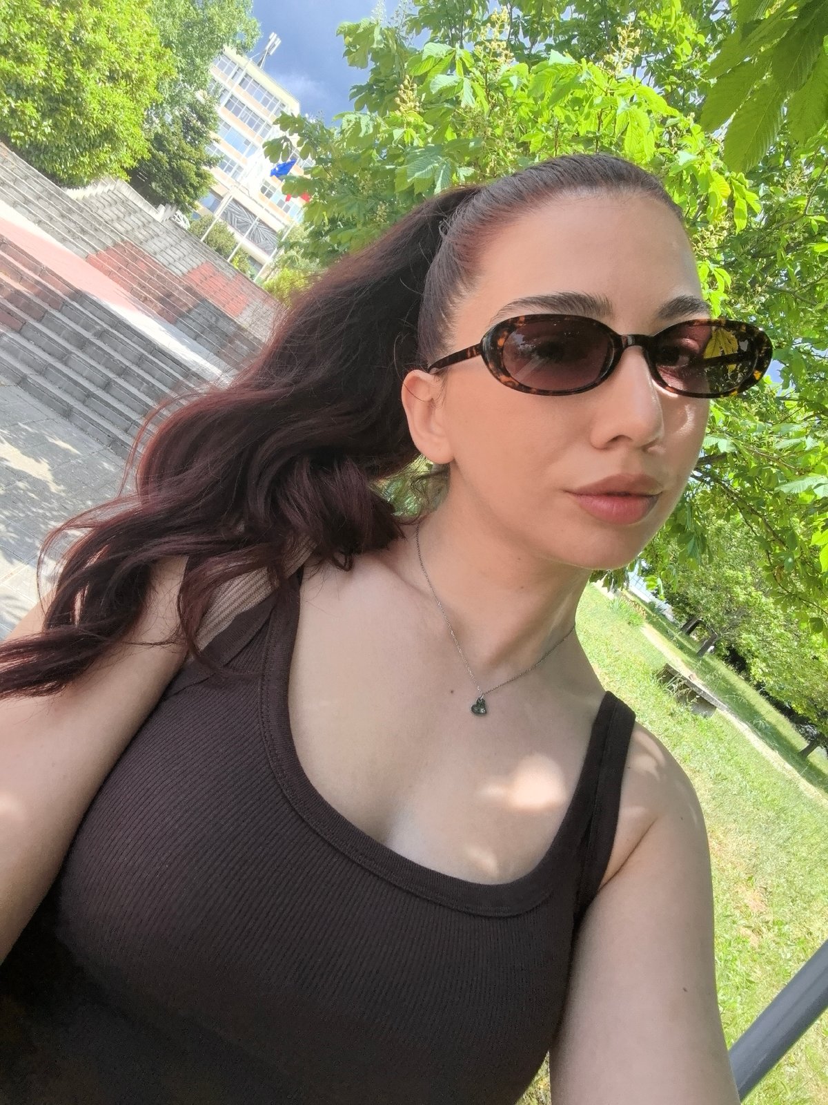 Woman documents selfies across indoor, outdoor locations over 90 minutes