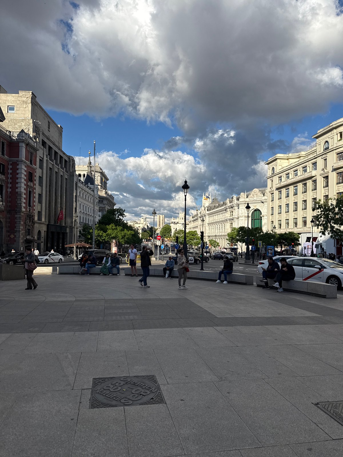 Evening street life documented in central Madrid