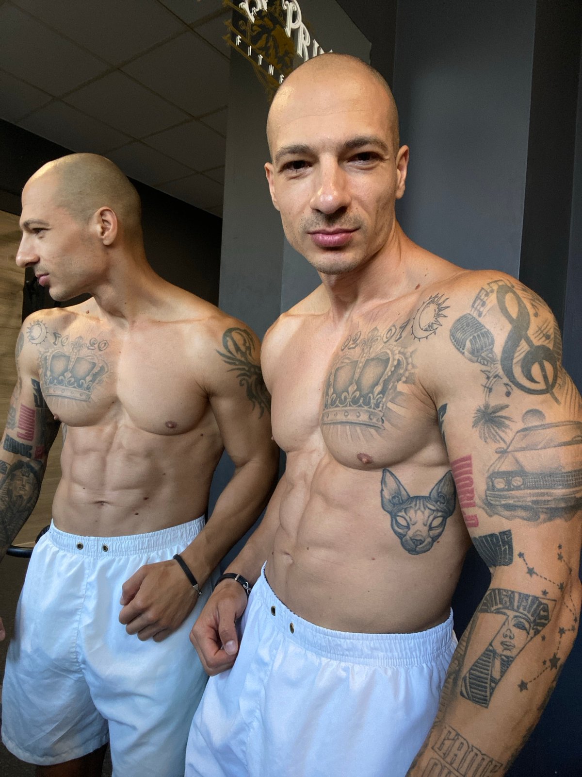 Gym crew poses inside and outside a Pleven fitness spot