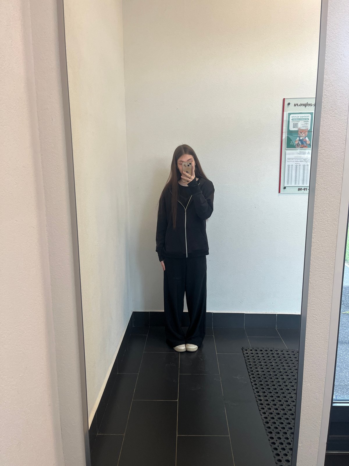 Two people observed in mirrored elevator in Russia