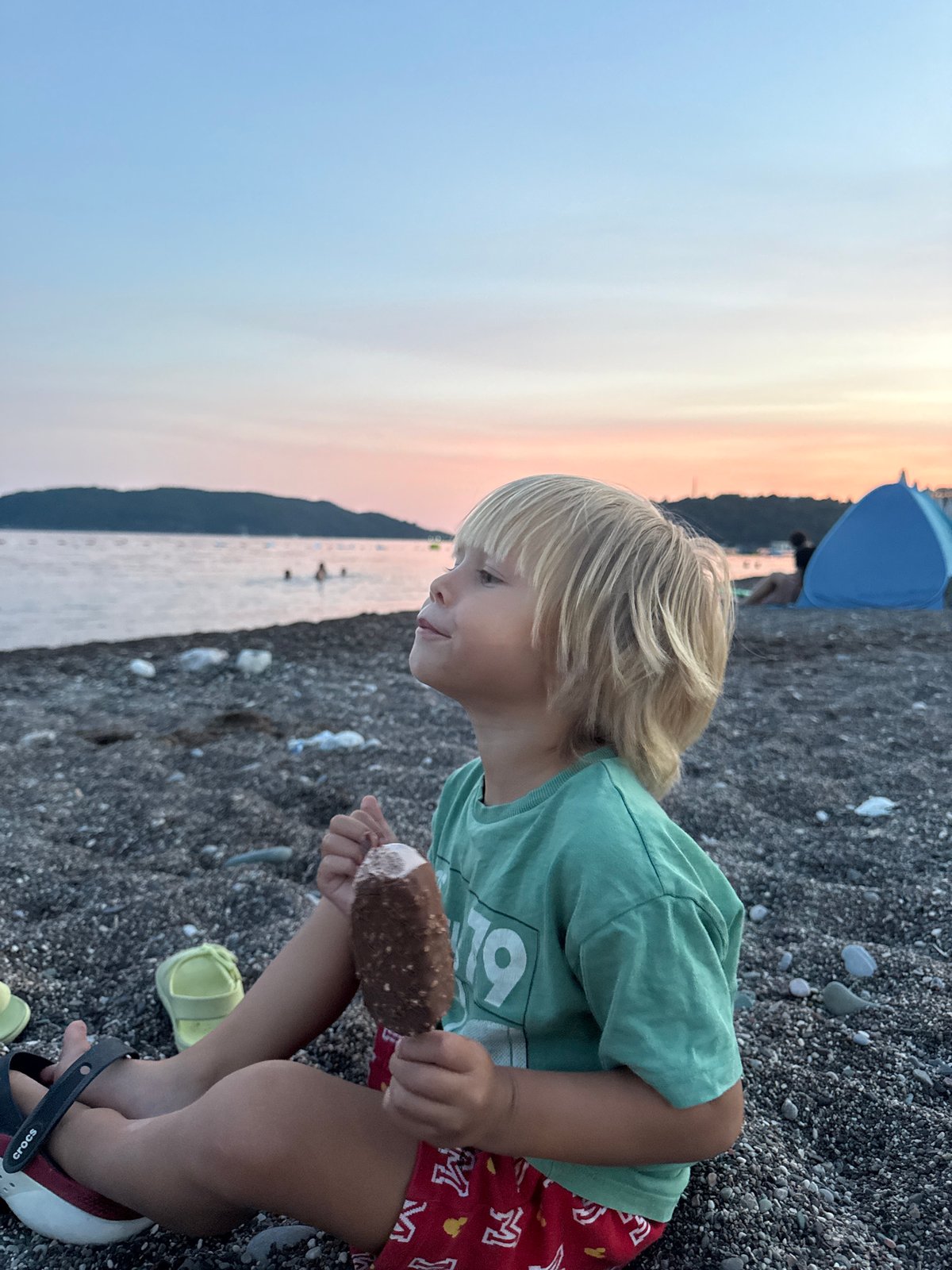 Late afternoon on a pebble beach in Boreti, Montenegro