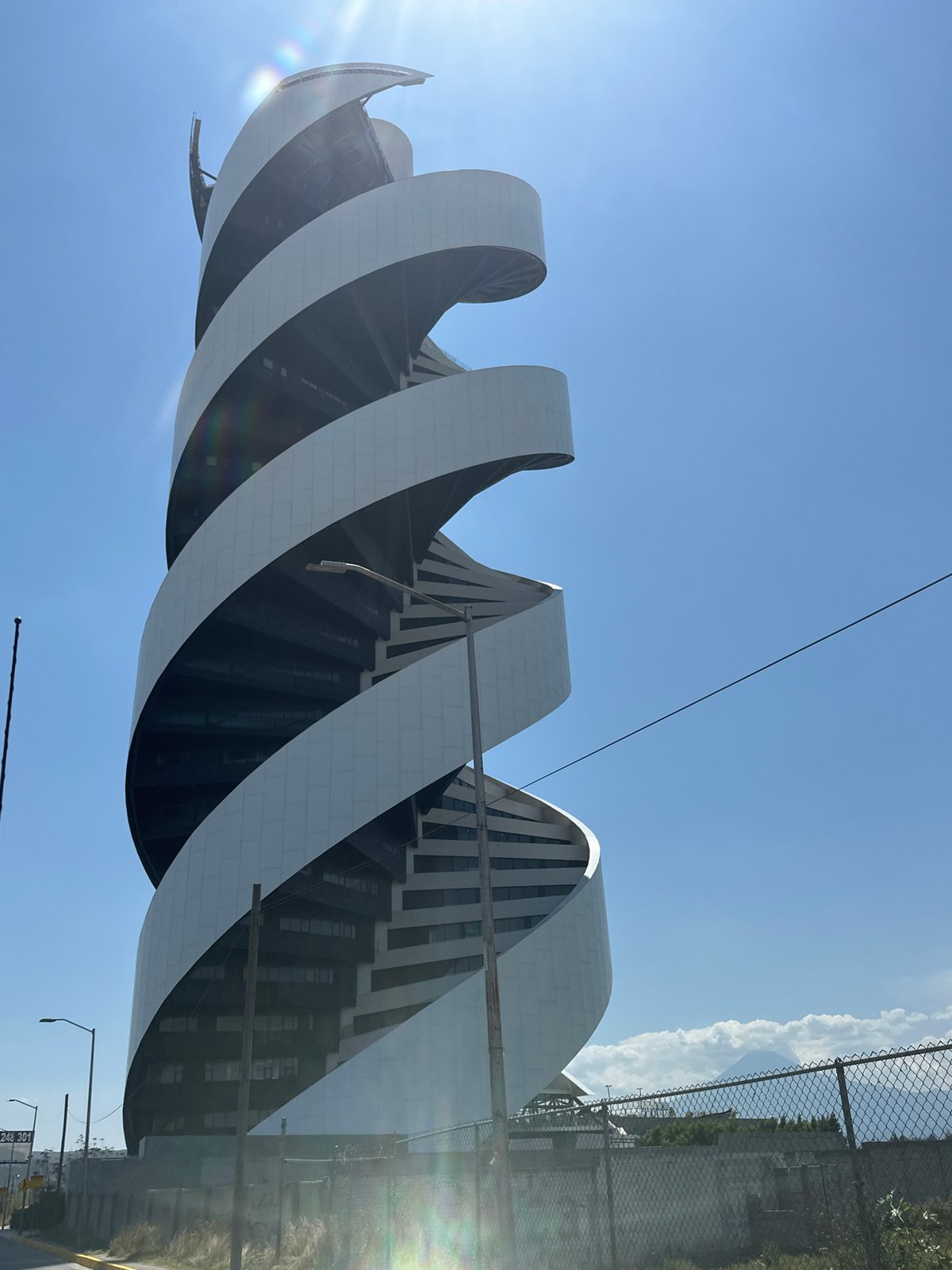 Modern wave-spiral building observed in Tlaxcalancingo, Mexico