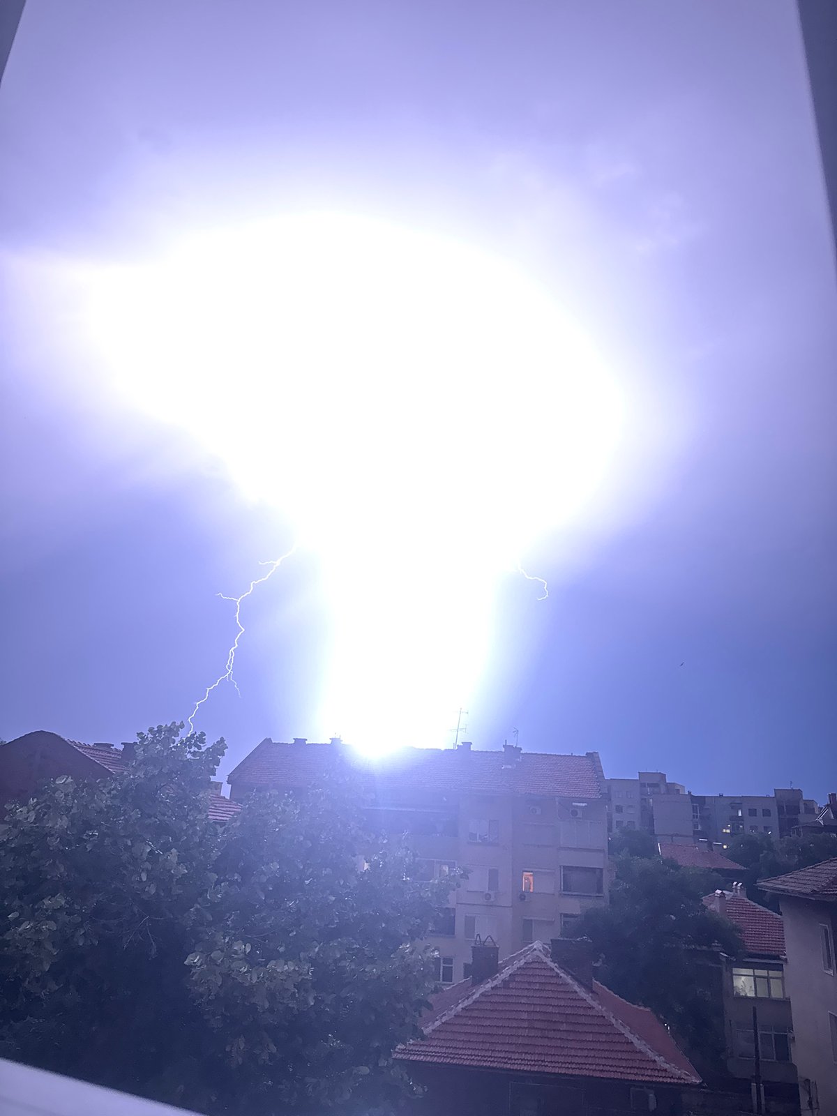 Lightning storm illuminates Plovdiv, Bulgaria evening sky