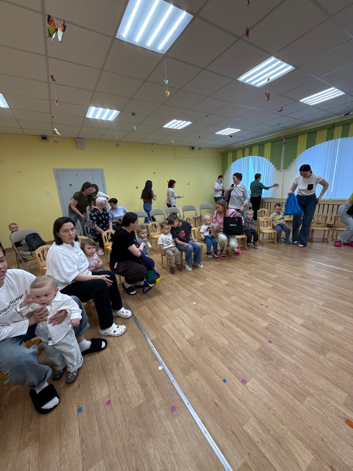 Community gathering observed in decorated room in Шебунино, Russia