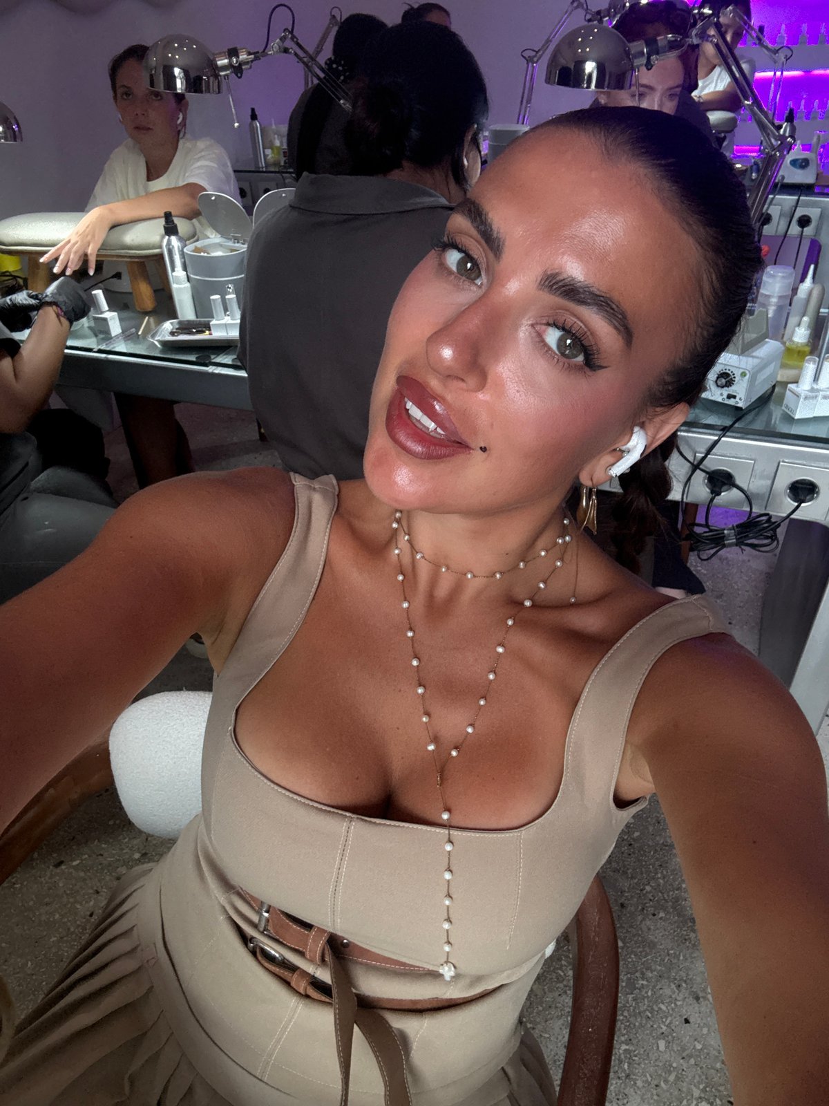 Woman documents nail salon visit with selfies in North Kuta