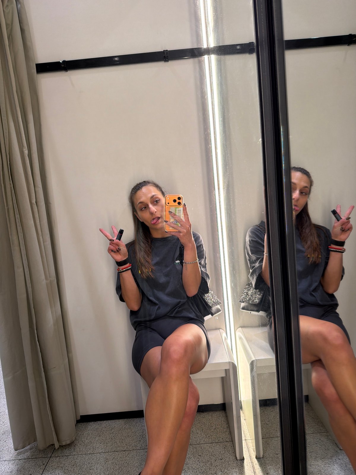Fitting room mirror selfies in a Plovdiv retail store