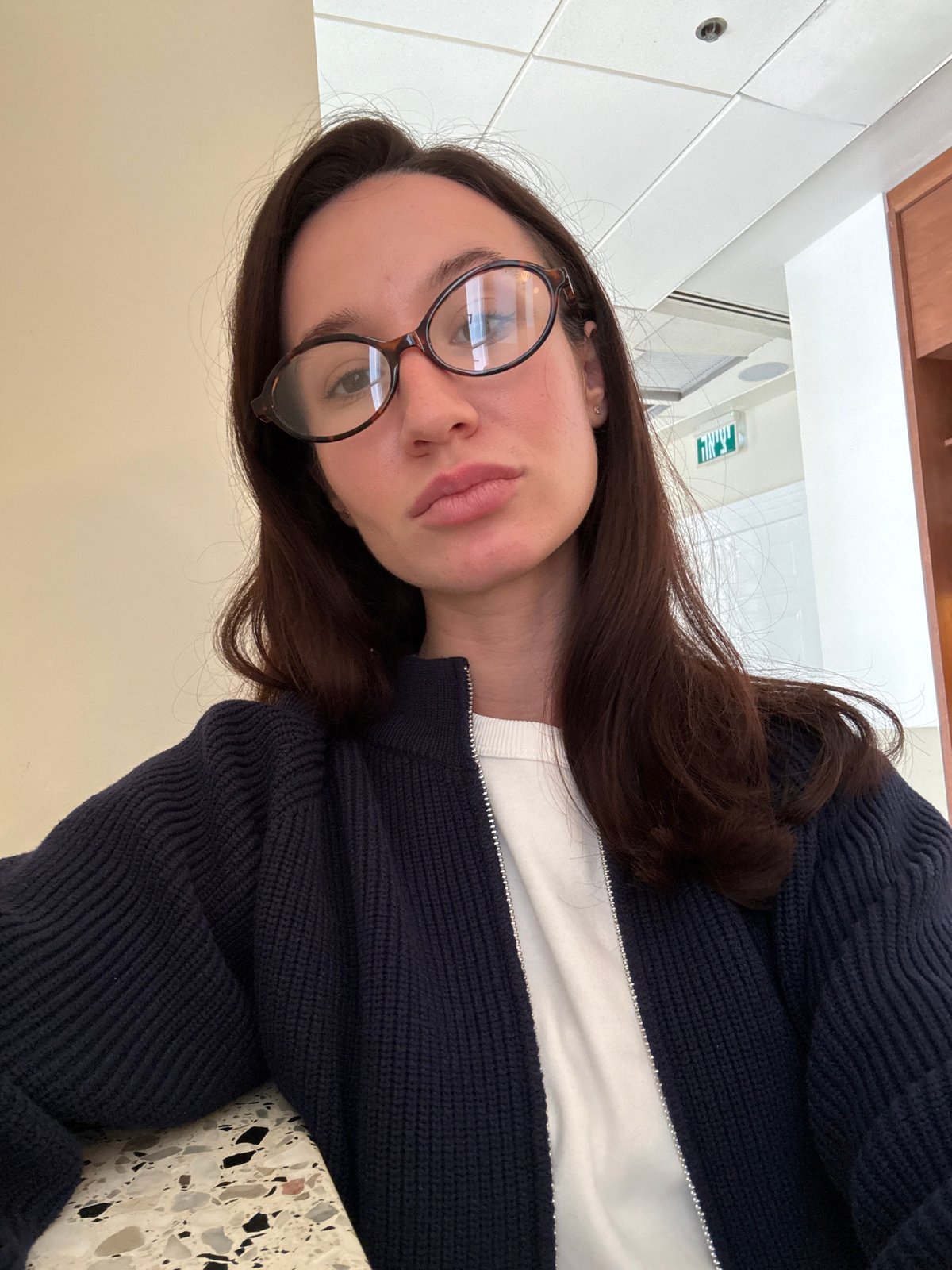 Woman takes morning selfies in Tel Aviv
