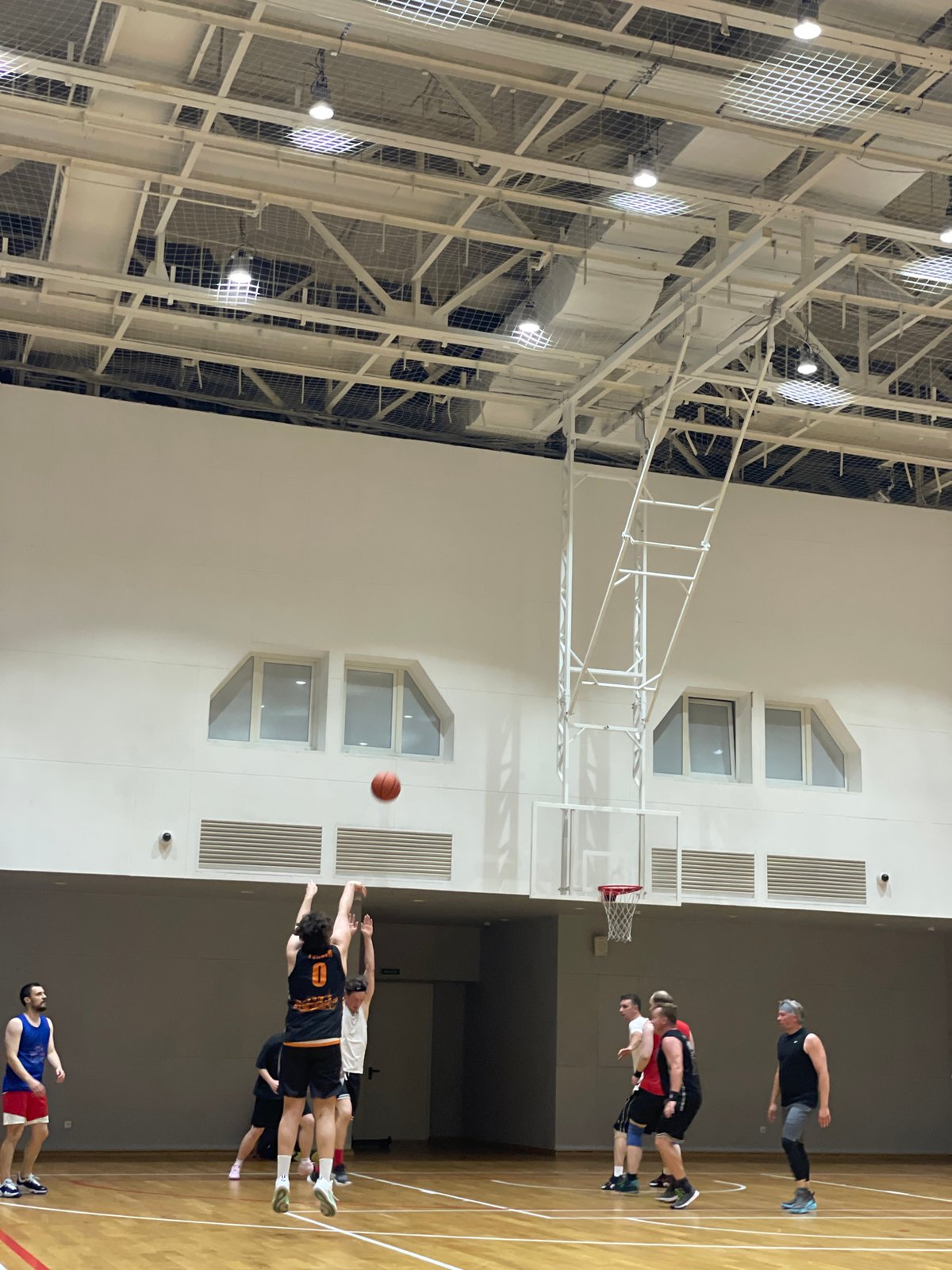 Indoor basketball session at a Saint Petersburg gym
