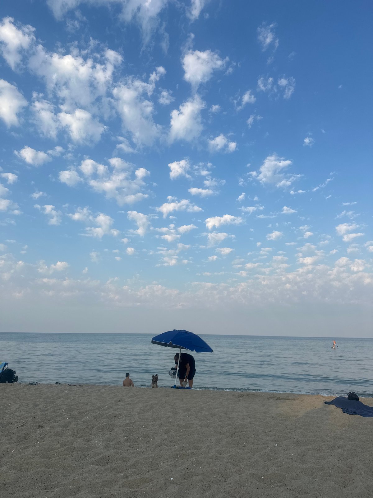 Beach afternoon fades into an urban neighborhood night