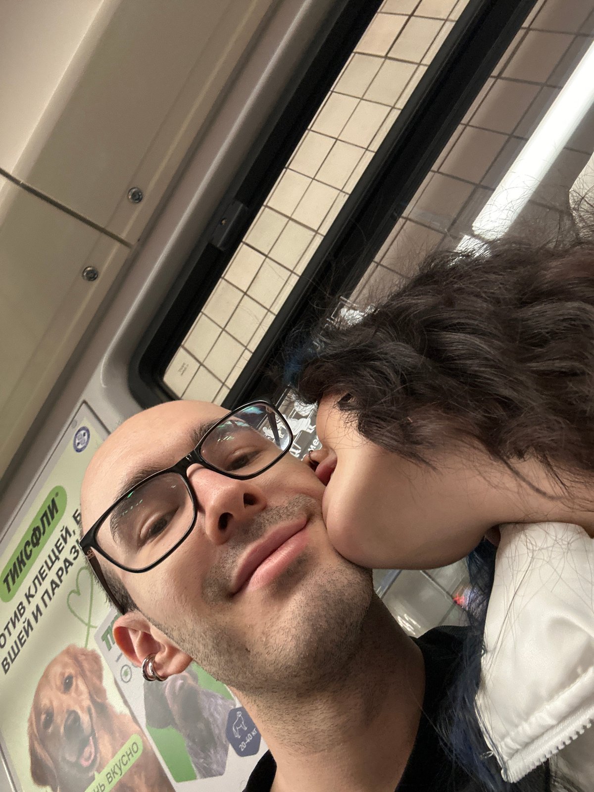 Intimate moment captured between couple in Moscow subway