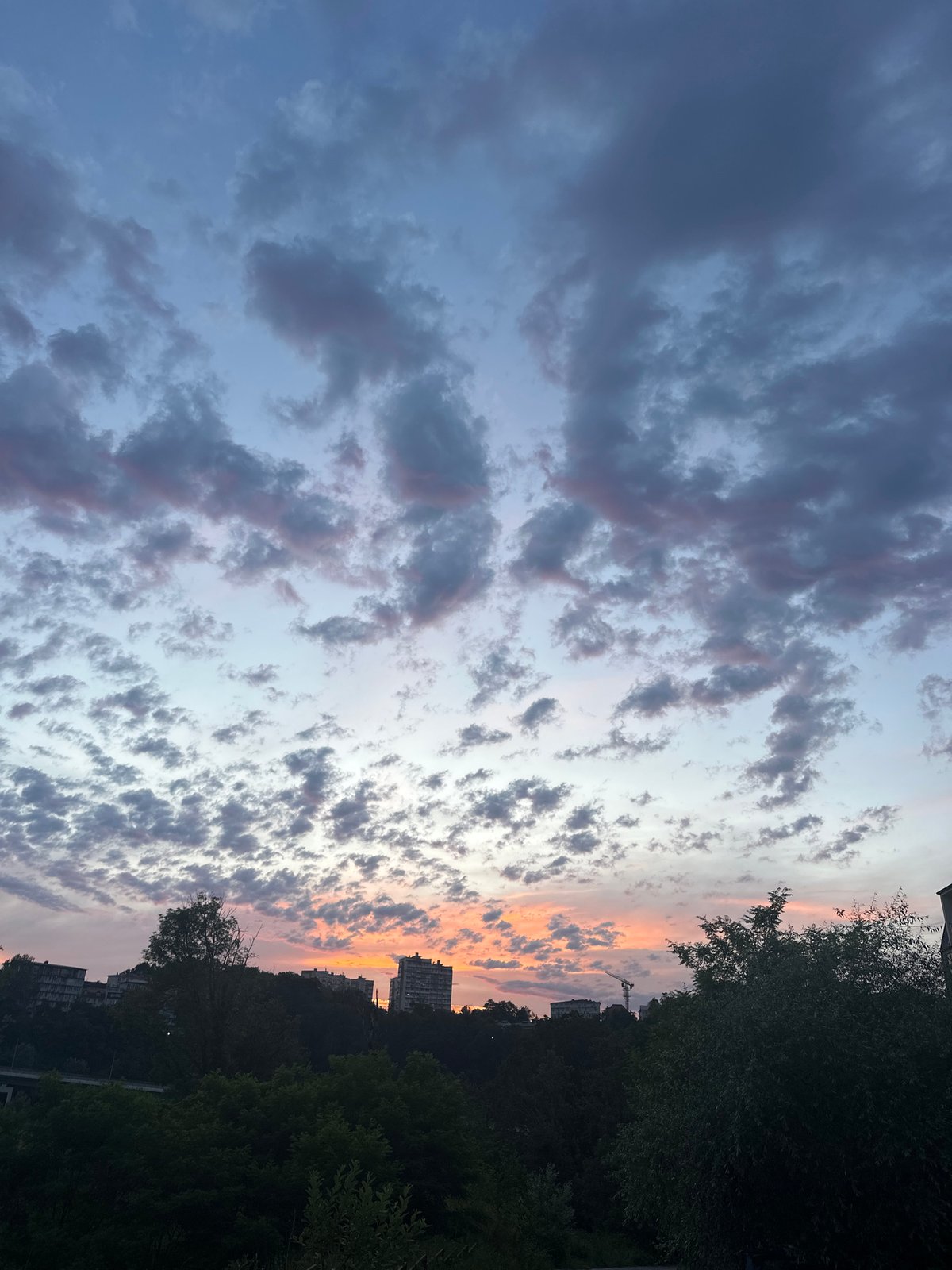Sunset skies and street life in Razdolnoye, Russia