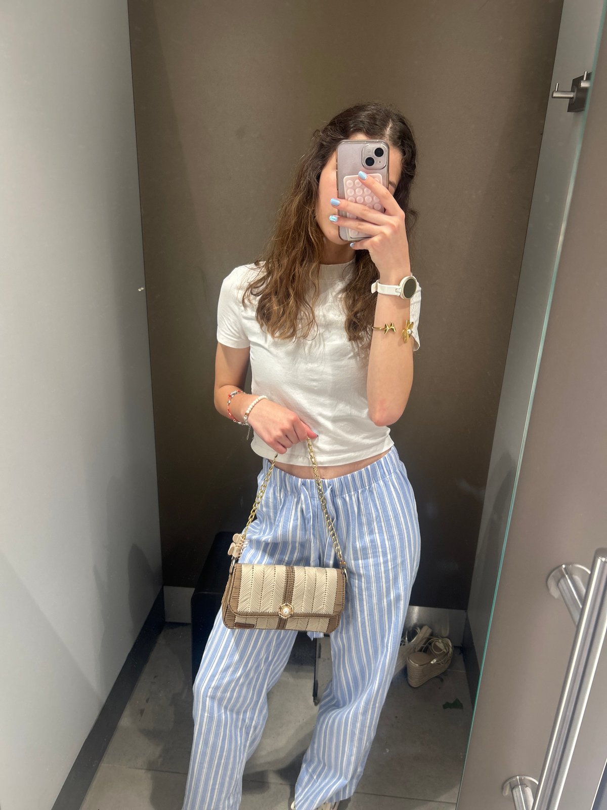 Fitting room outfit try-on session in Ruse