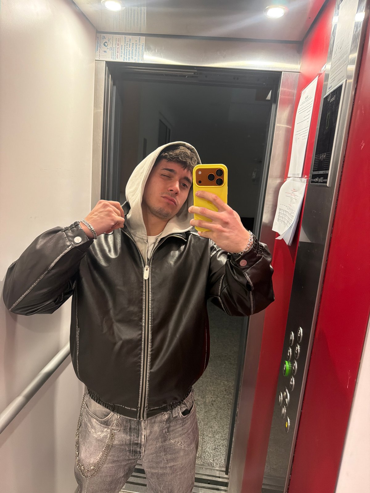 Young man takes elevator selfies in Sofia, Bulgaria