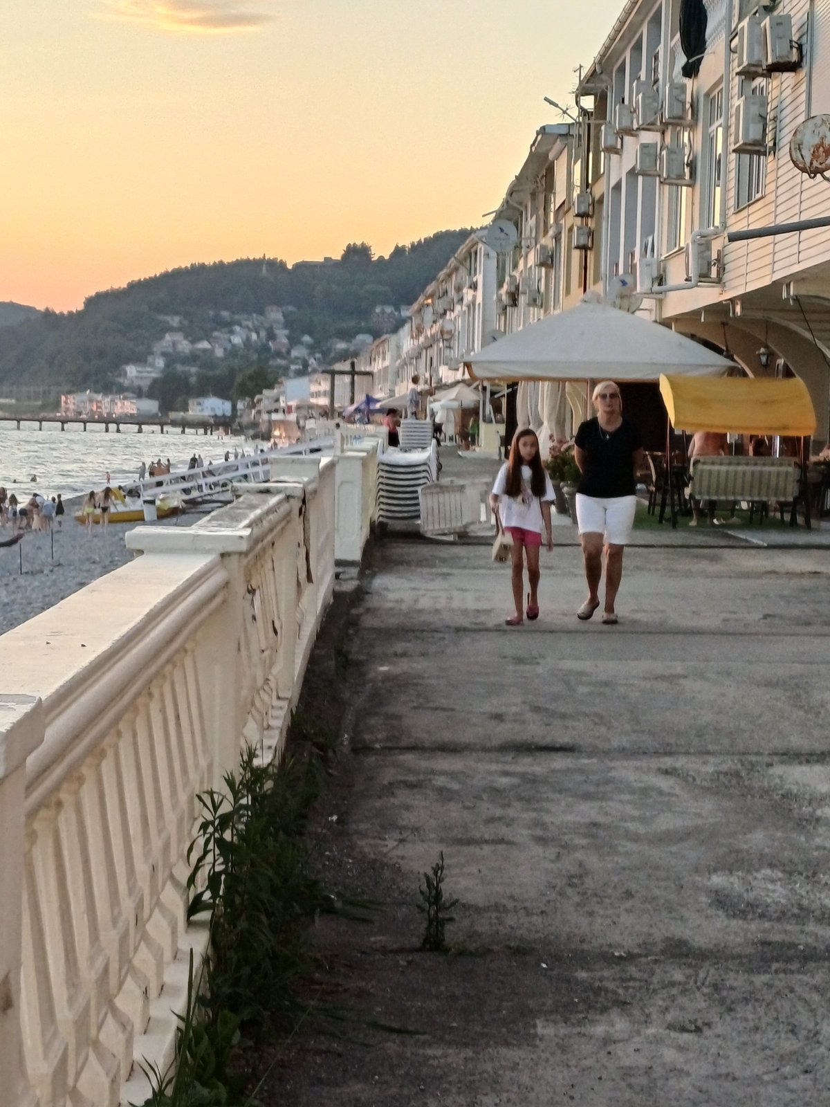 Sunset hour on Sochi's Black Sea pebble beach
