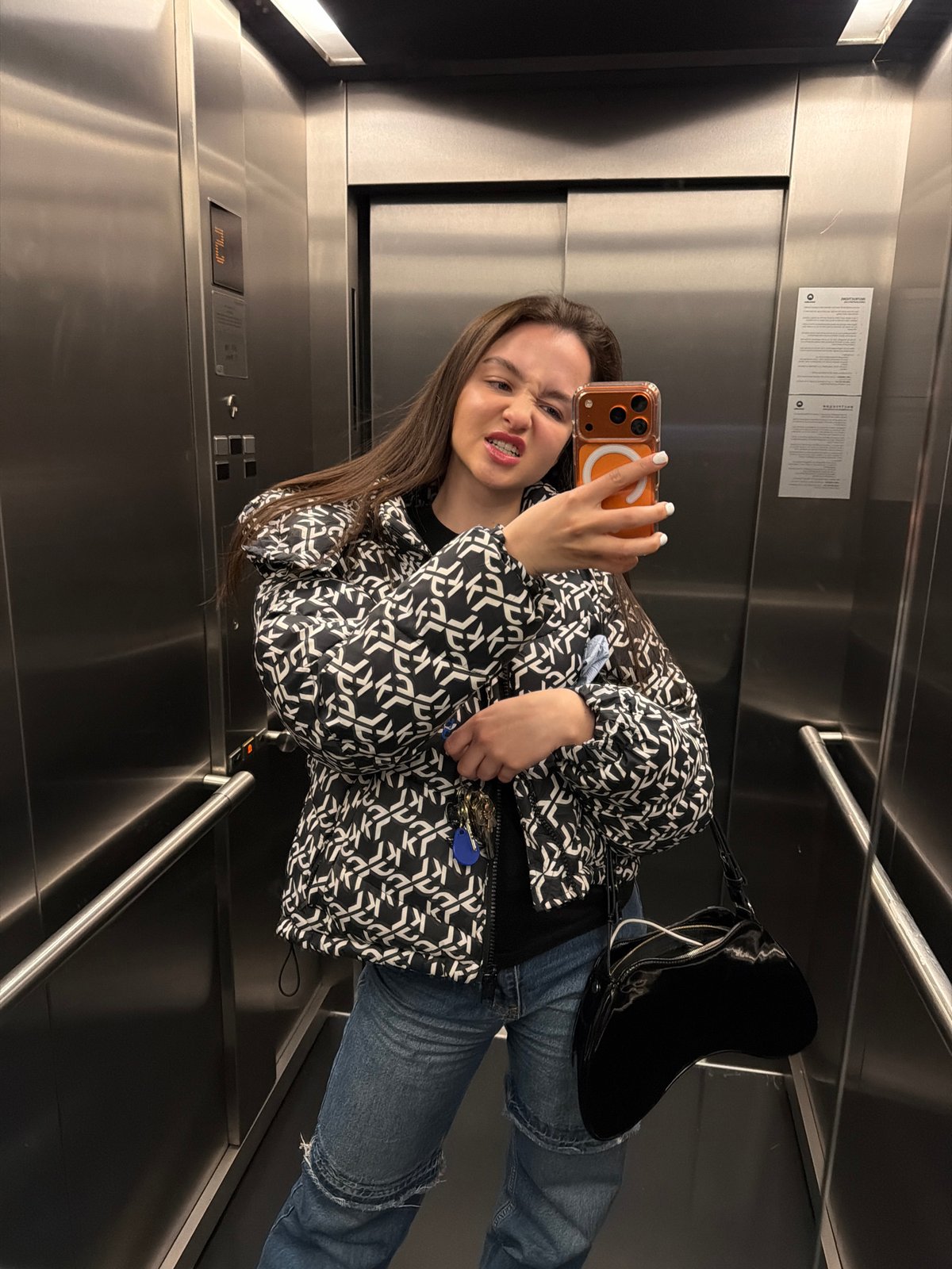 Woman takes elevator selfies in Sofia building