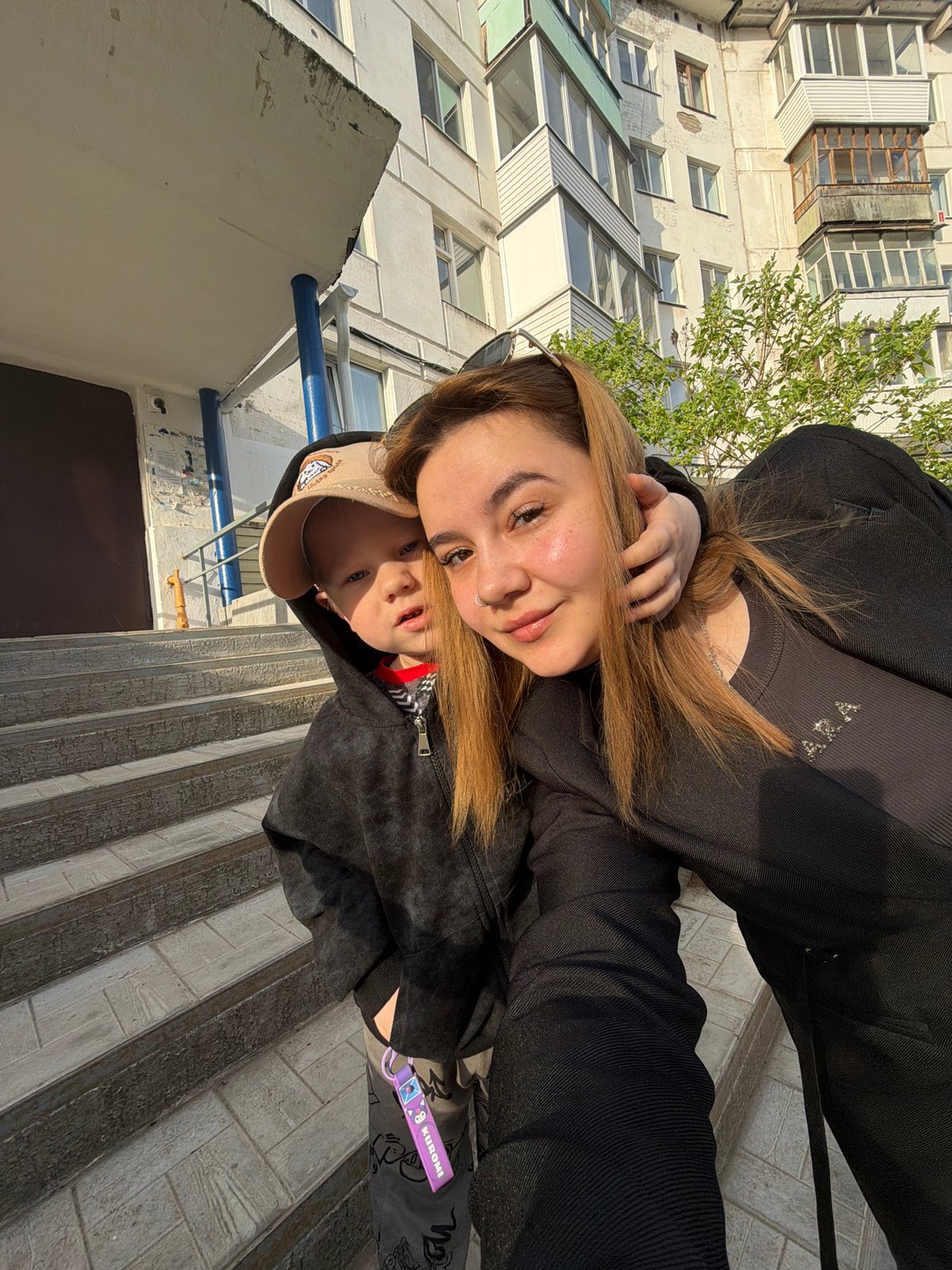 Woman and child photographed during early morning in Chaikovsky, Russia