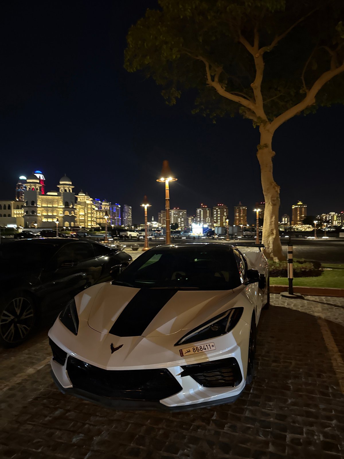 White Corvette spotted near Boho Social restaurant in Doha