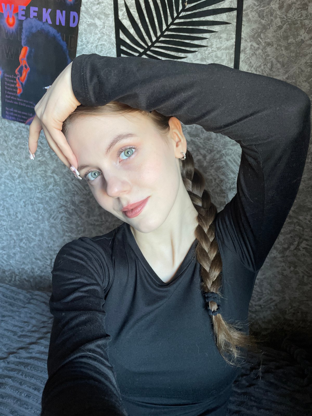Woman rests on sofa in Foki, Russia