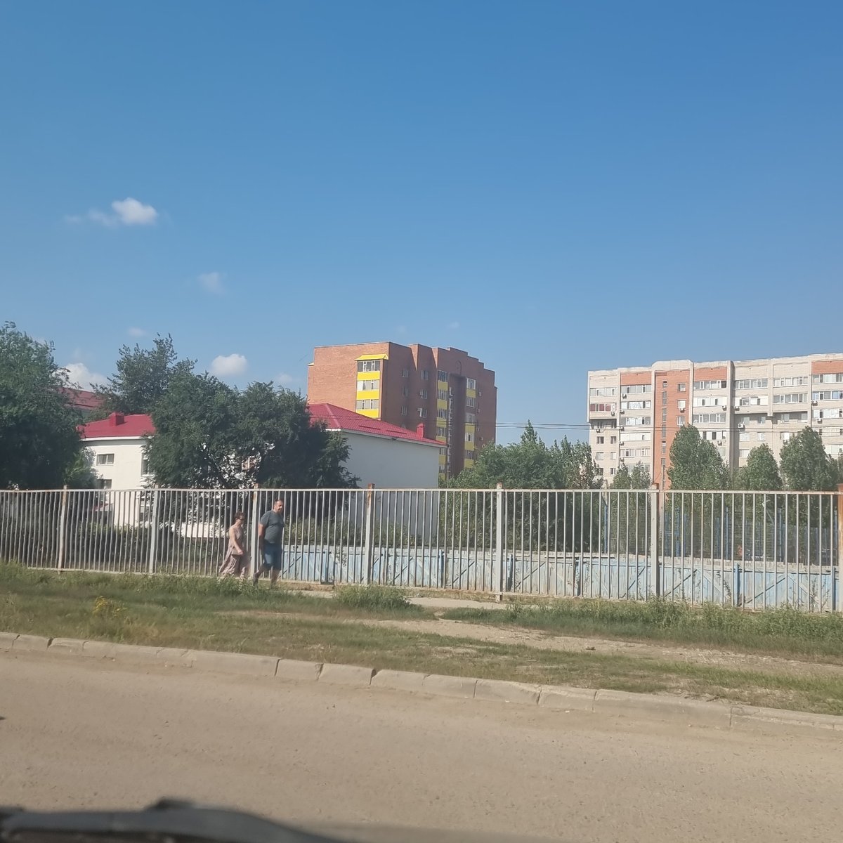 Everyday street life in Aktobe, Kazakhstan, one summer morning