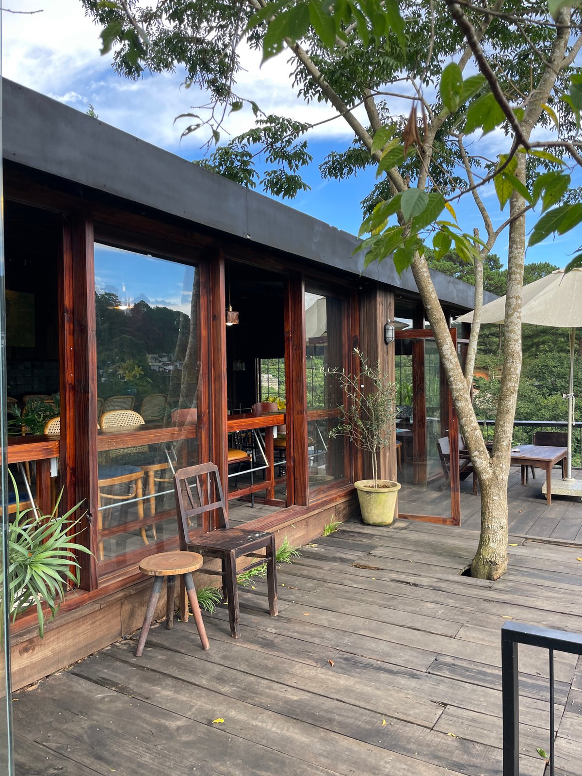 Morning at hillside cafe in Da Lat with valley views
