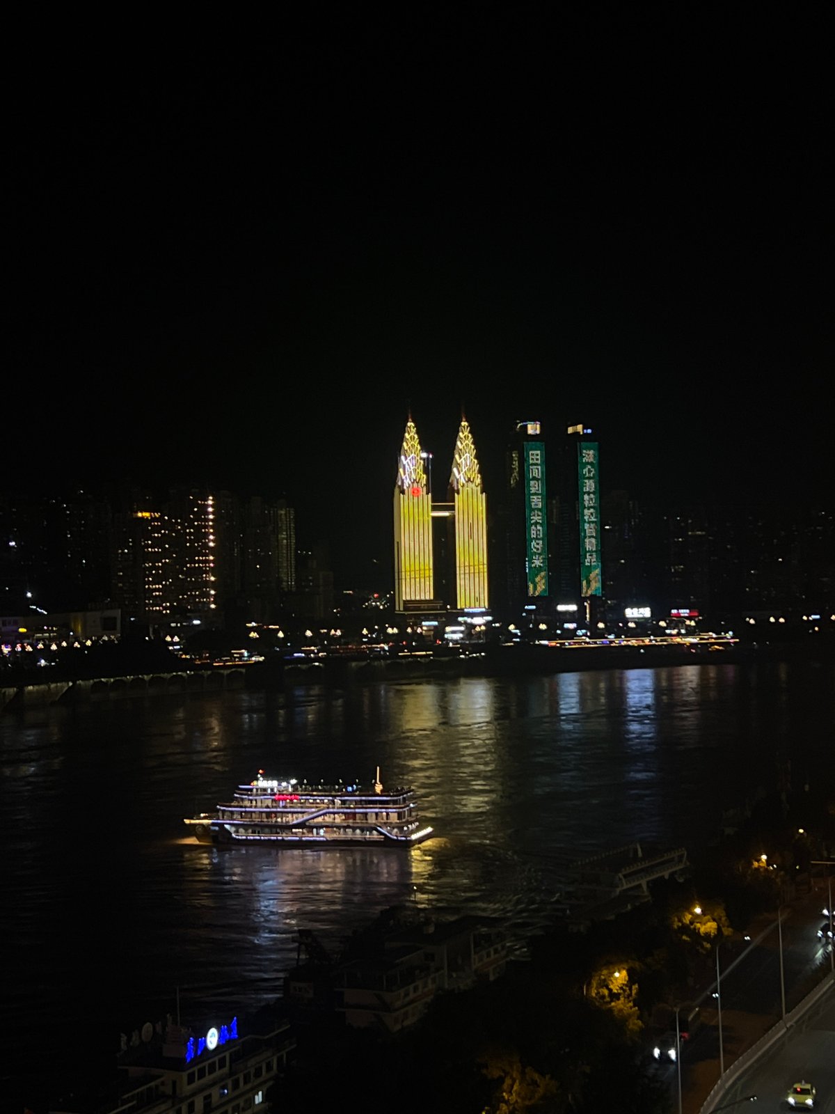 Chongqing's Yuzhong riverfront and Hongyadong complex lit up at night