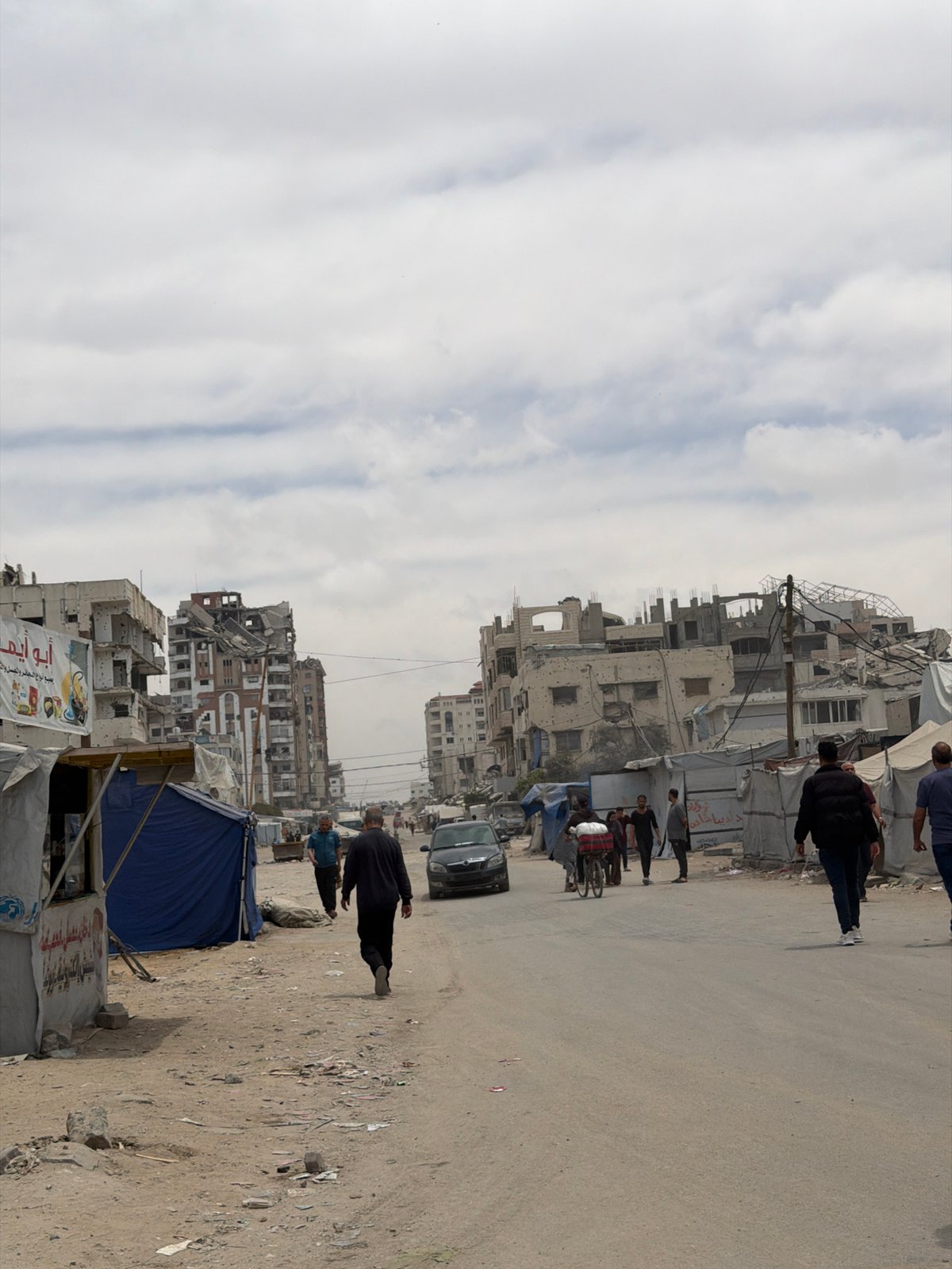 Gaza street activity observed amid damaged buildings, makeshift shelters
