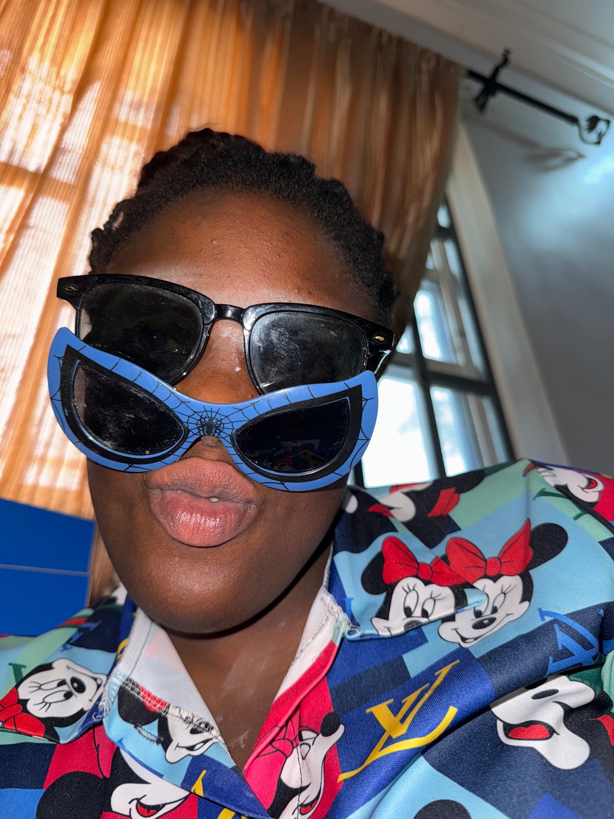 Playful photo session with costume accessories in Nigeria bedroom