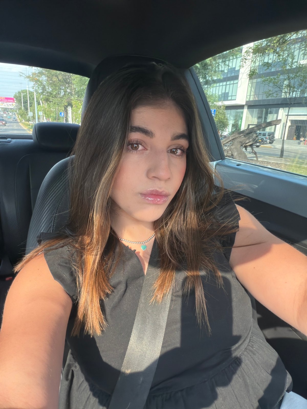 Two women photographed in car in Tlaxcalancingo, Mexico