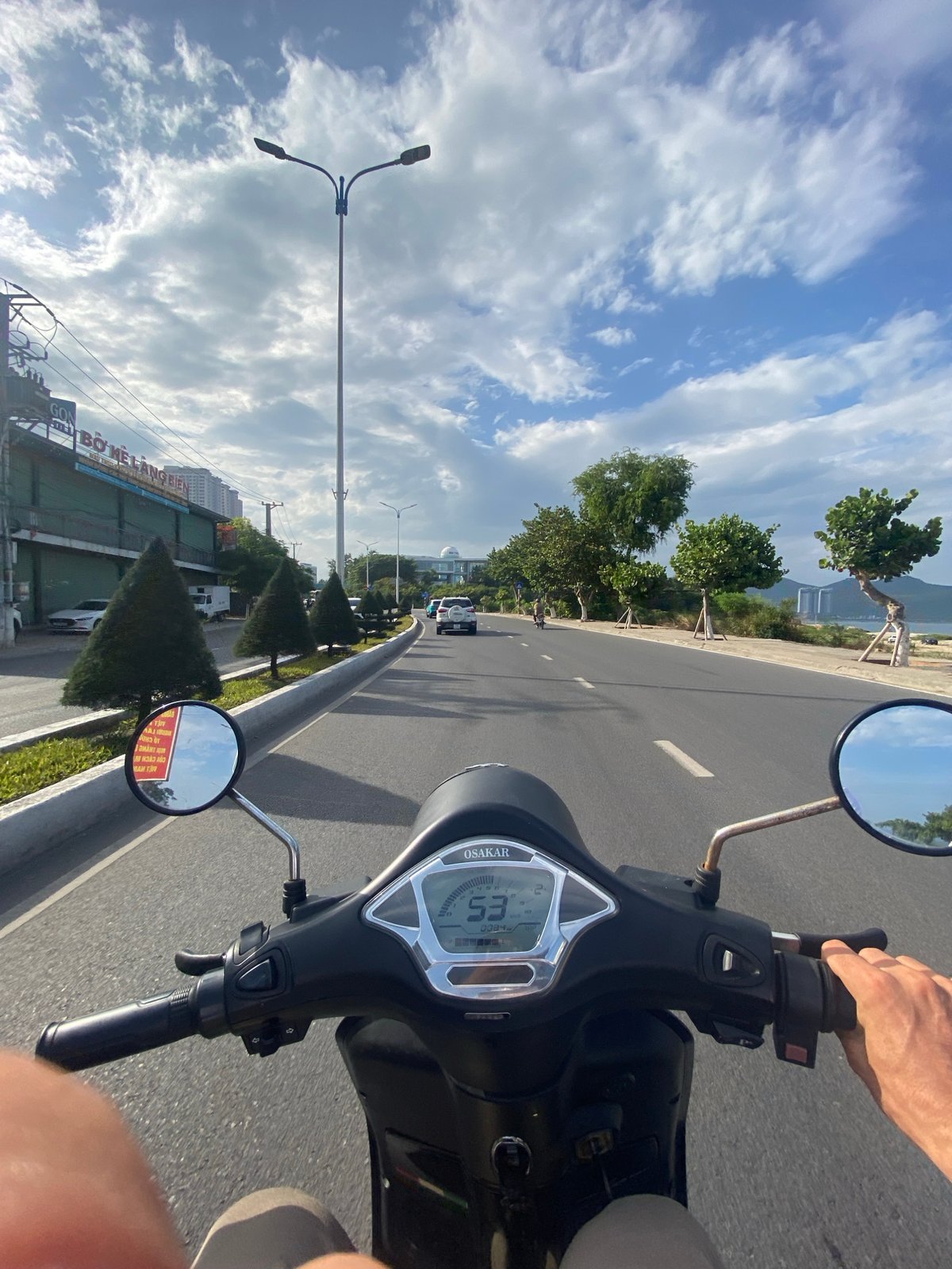 Scooter POV along Nha Trang's Tran Phu coastal road