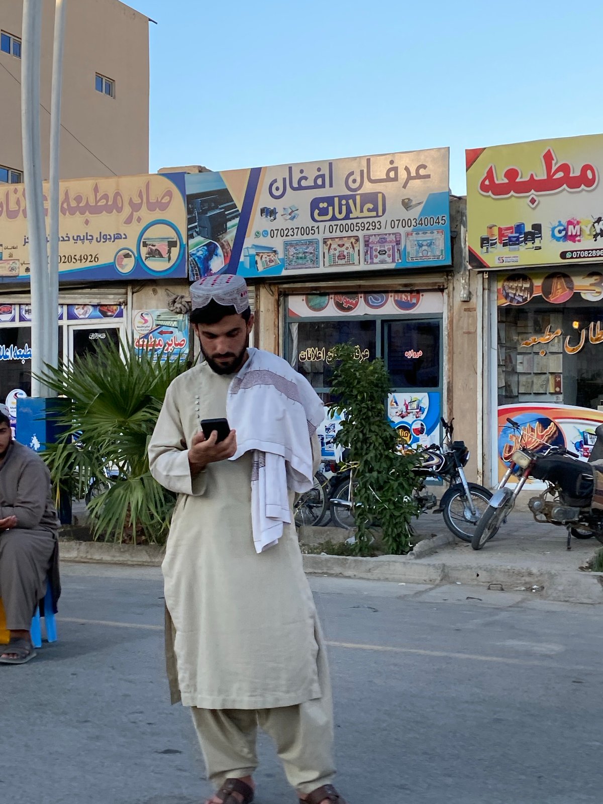 Street life in Kandahar captured across a busy late afternoon