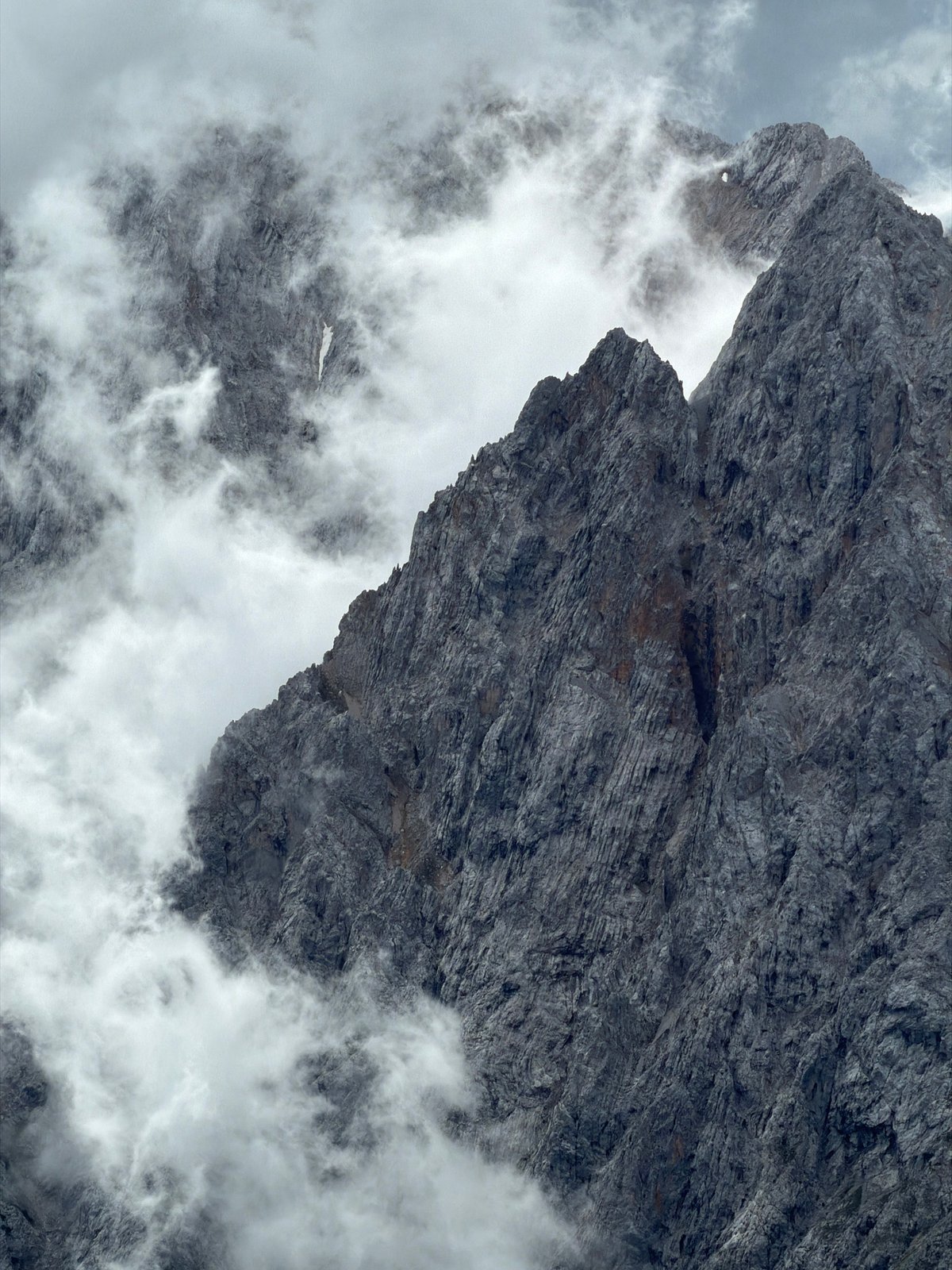 Misty Alpine peaks above Garmisch-Partenkirchen on a cloudy morning