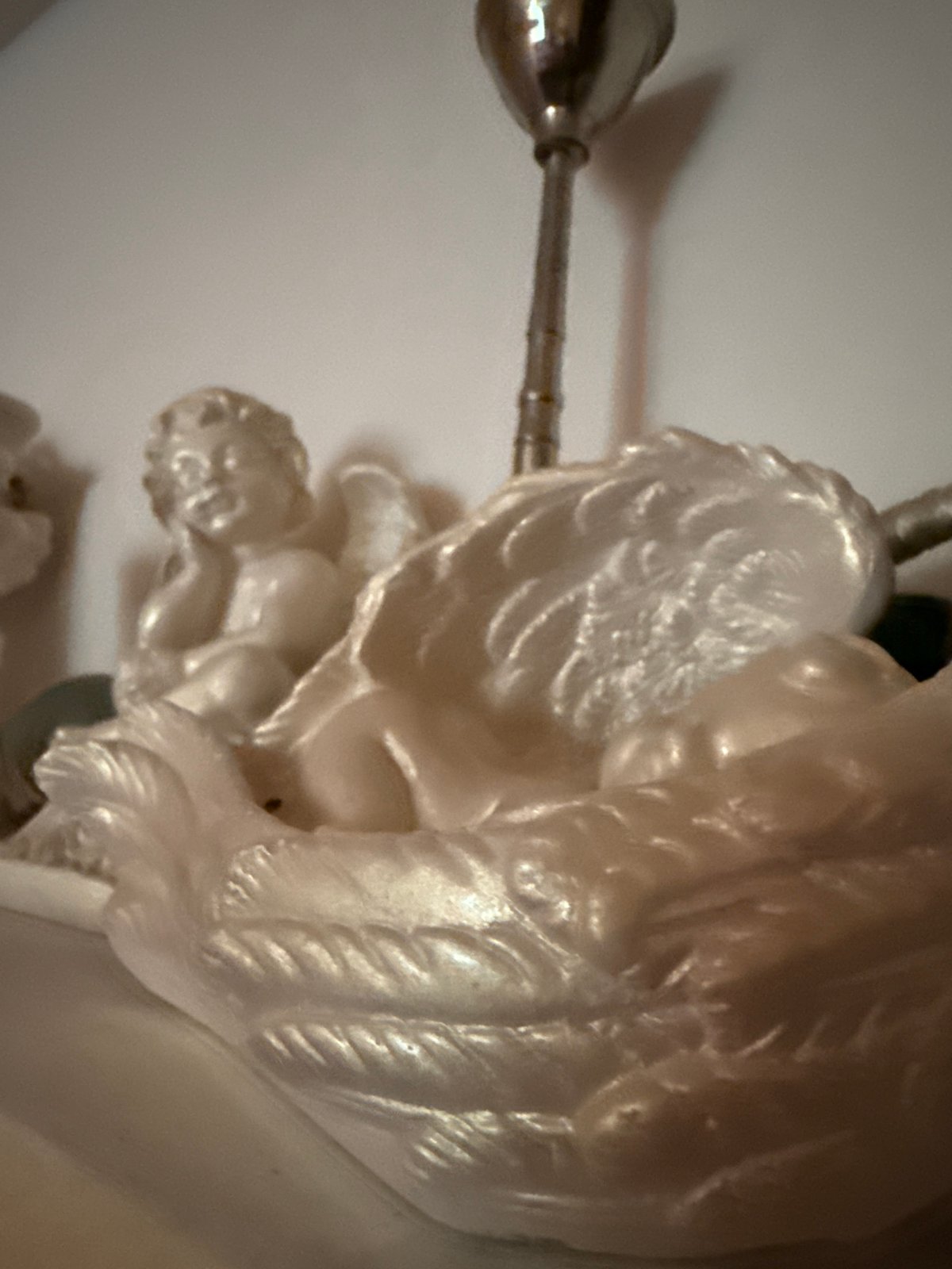 Home interior details: sleeping cats, figurines, and decorative objects