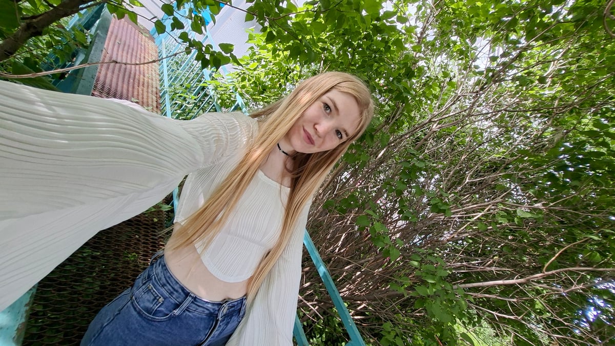 Woman takes selfies on stairs in Chaikovsky, Russia