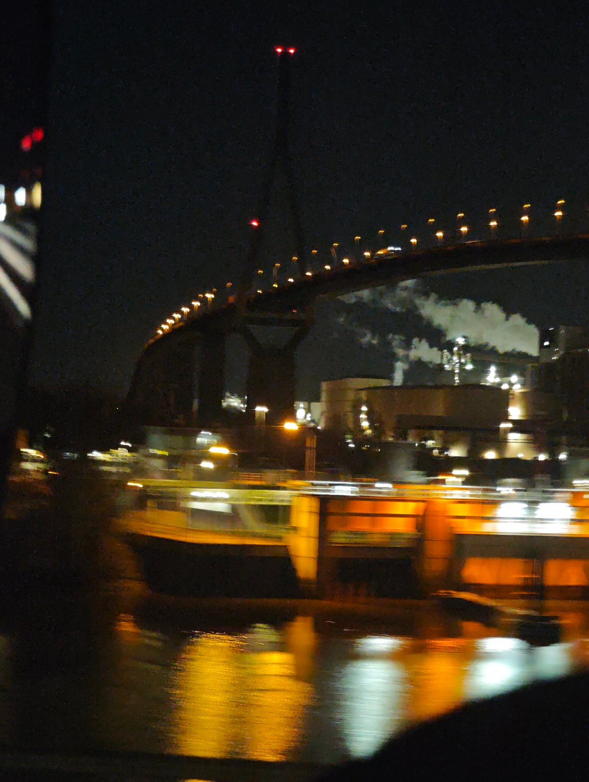 Hamburg waterfront bridge illuminated at night
