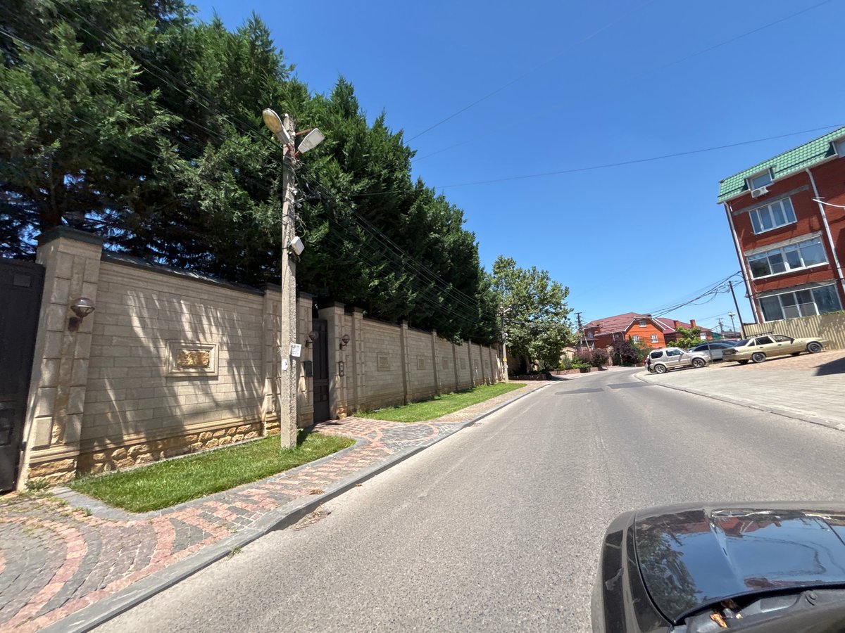 Driving through a quiet residential street in Krasnodar