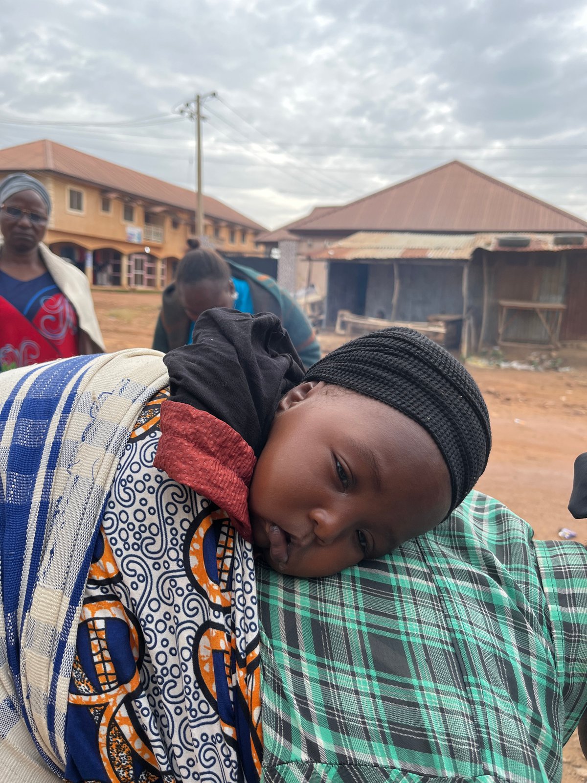 Morning street life across Jos, Nigeria's urban neighborhoods
