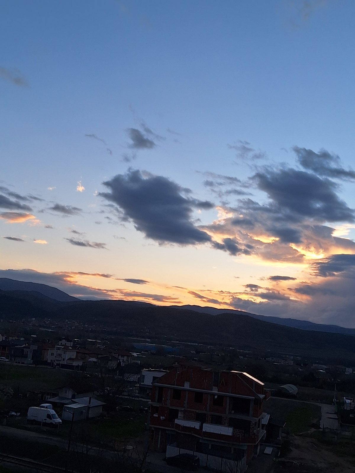 Evening skyline documented from rooftop in Blagoevgrad, Bulgaria