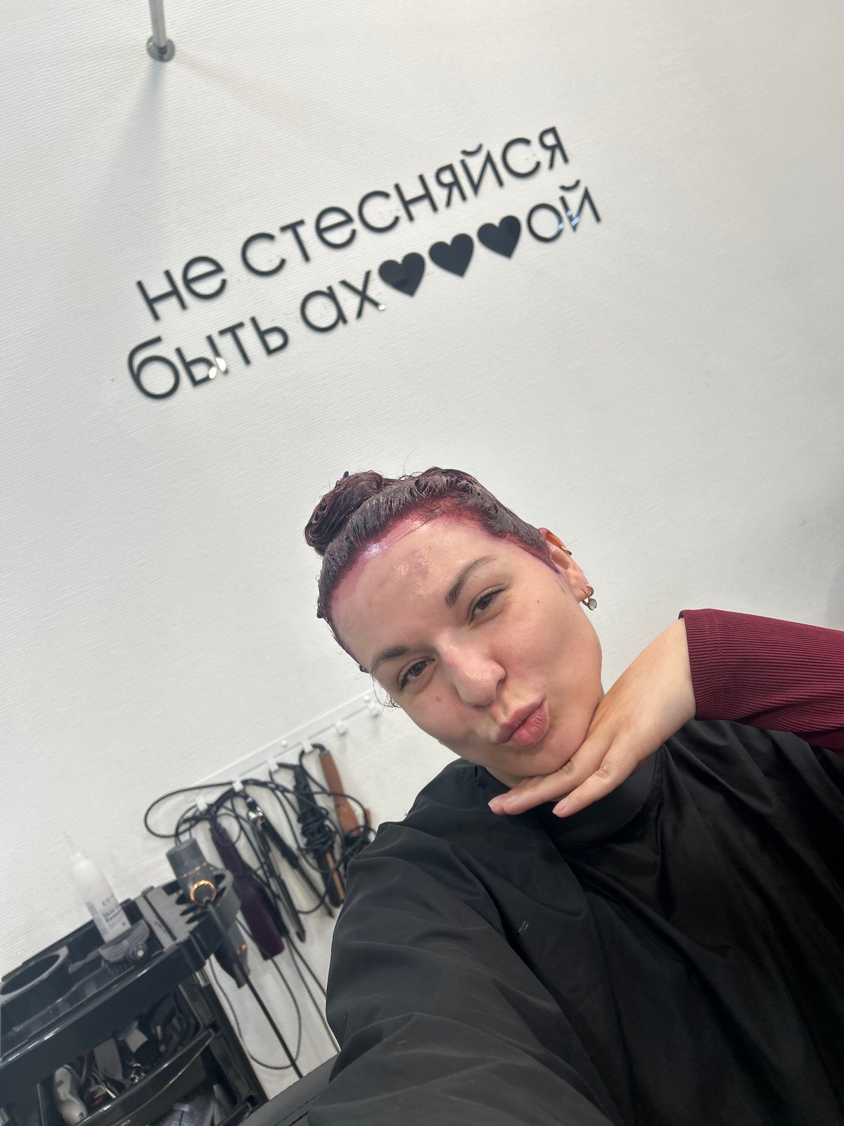 Woman documents purple hair dyeing session at Chaikovsky salon