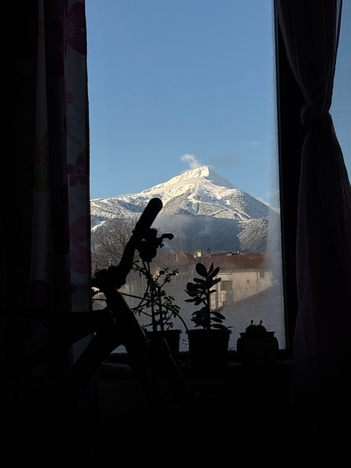 Morning mountain views captured from windows in Bansko, Bulgaria