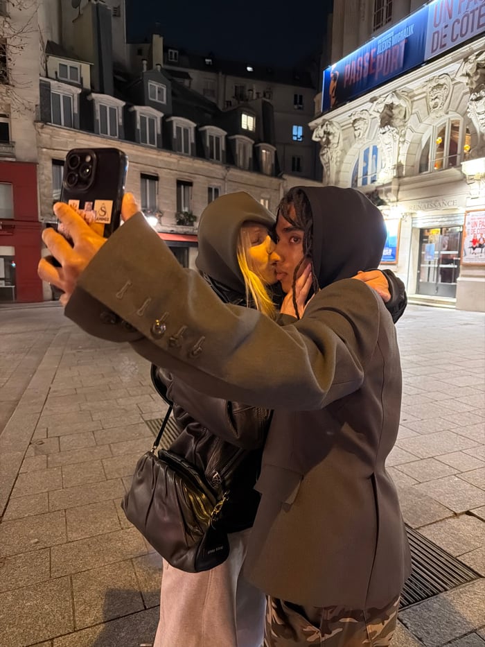 Young adults document evening social outing across central Paris