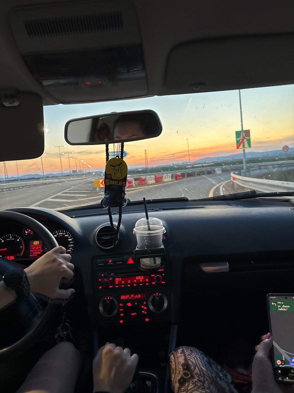 Driver travels highway near Mramor, Bulgaria at sunset