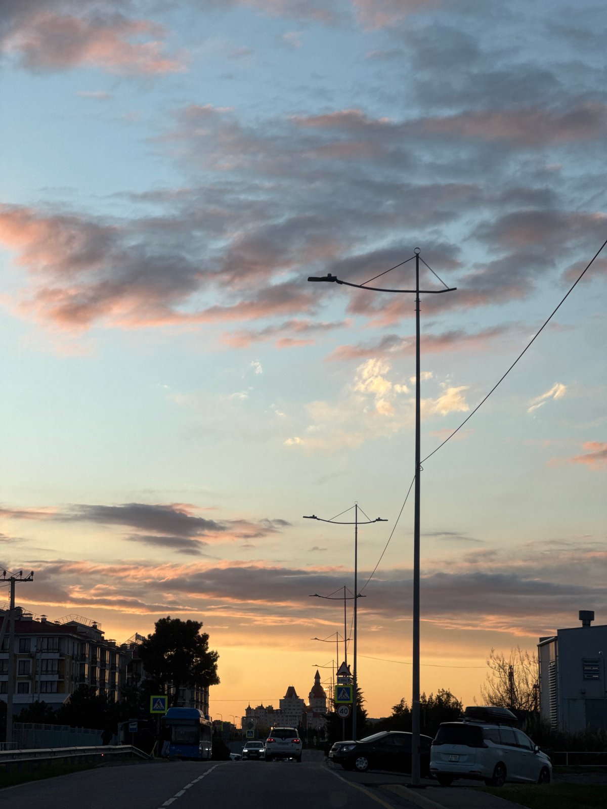 Twilight captures colorful sky over Sirius, Russia street scene