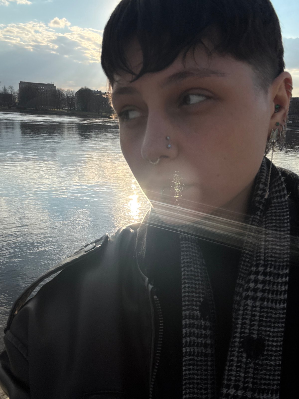 Casual waterfront gathering documented in Saint Petersburg