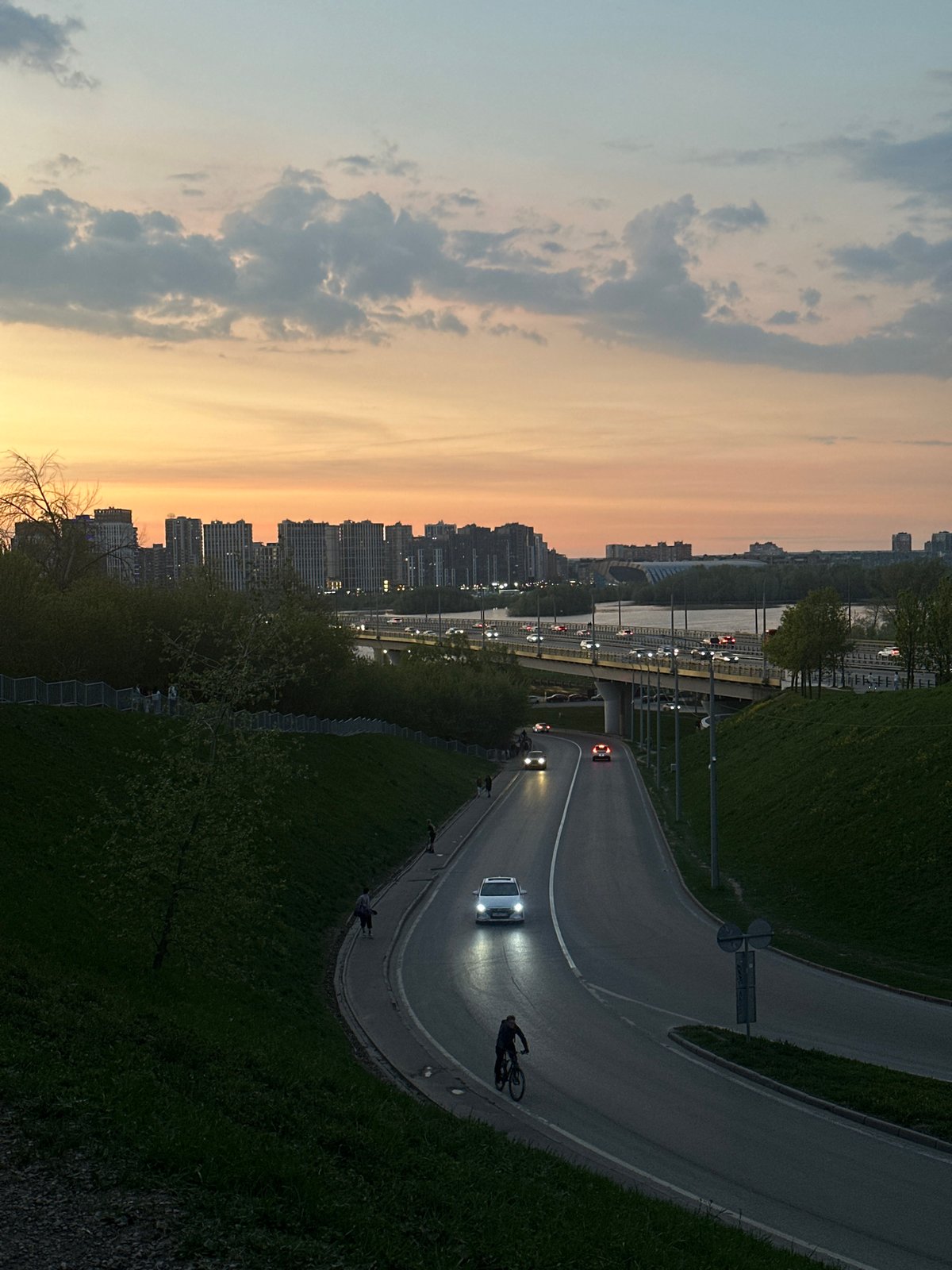 Sunset observed over Kazan skyline and river bridge