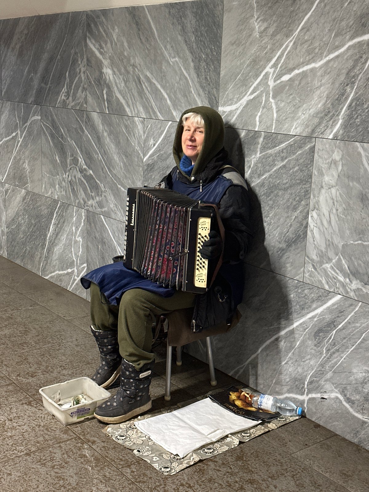 Accordion player performs in Nizhny Novgorod subway station