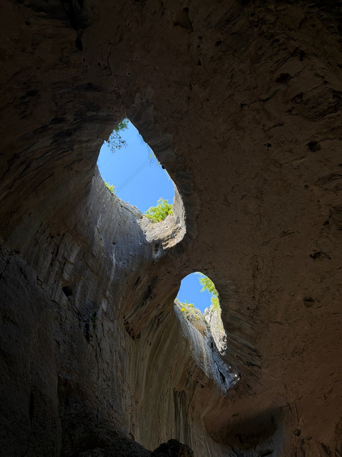 Tourists explore Bulgarian cave, rock climb, dine during spring outing